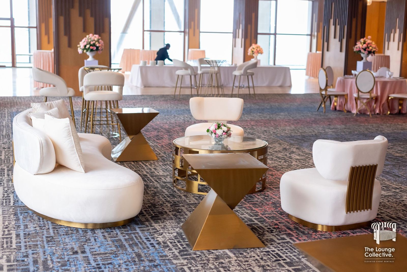 Brushed Gold lounge with curved sofa, armchairs and gold tables at a graduation celebration